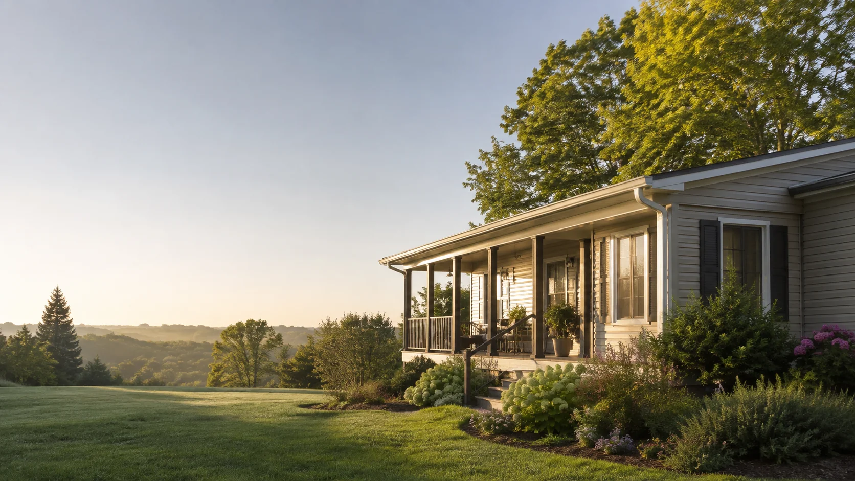 Manufactured home with covered porch on an elevated lot